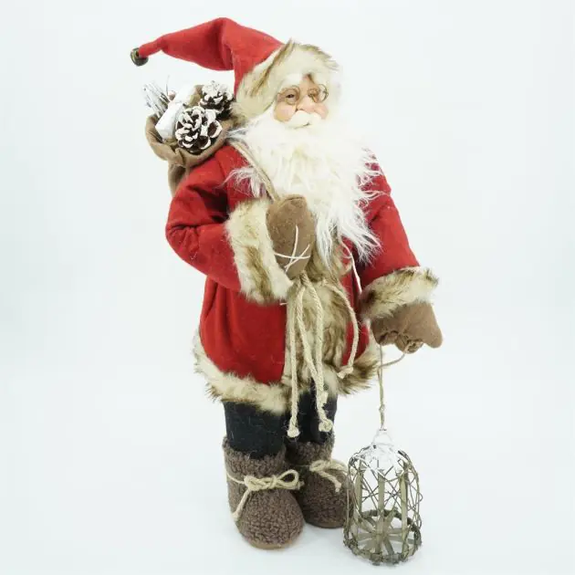 Red Santa Claus with wooden basket and hessian sack